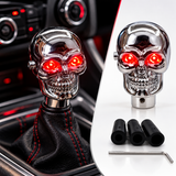 AutoBizarre Silver Chrome Metal Skull Shaped Gear Shift Knob with Red Illuminated Eyes LED Lights Universal for All Cars