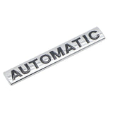 AutoBizarre 3D Raised Silver Black Automatic Metal Monogram Emblem Badge Sticker for All Cars & Bikes