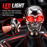 AutoBizarre Silver Chrome Metal Skull Shaped Gear Shift Knob with Red Illuminated Eyes LED Lights Universal for All Cars