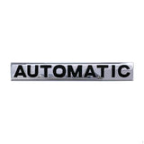AutoBizarre 3D Raised Silver Black Automatic Metal Monogram Emblem Badge Sticker for All Cars & Bikes