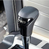 AutoBizarre Car Styling Faux Leather Carbon Fiber Finish Gear Shift Knob with Different Size adaptors for All Automatic Transmission Cars